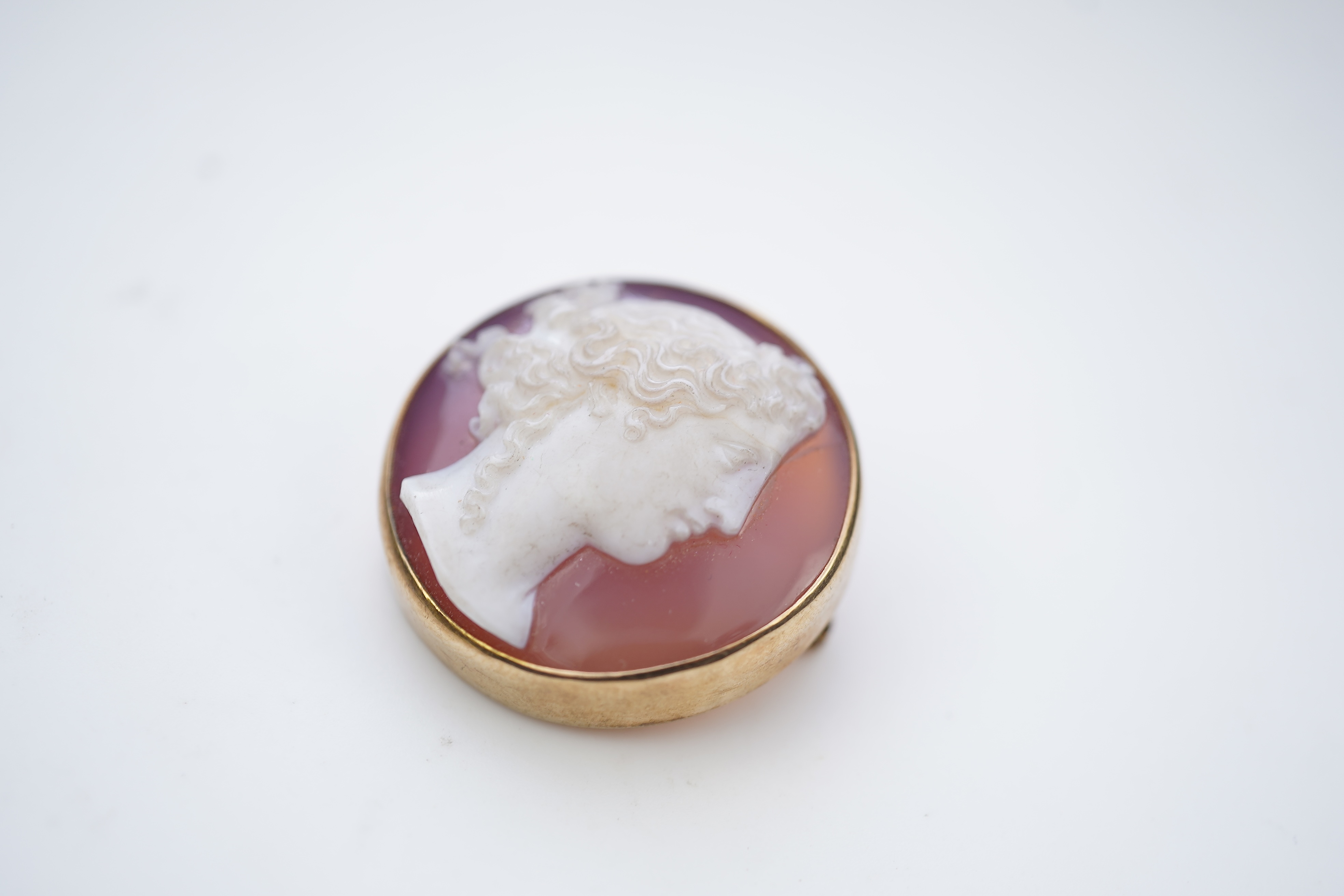 A Victorian onyx cameo brooch, late 19th century
